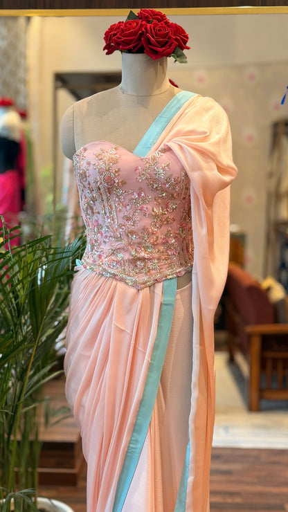 Baby Pink Embellished Corset with Blue Border Saree