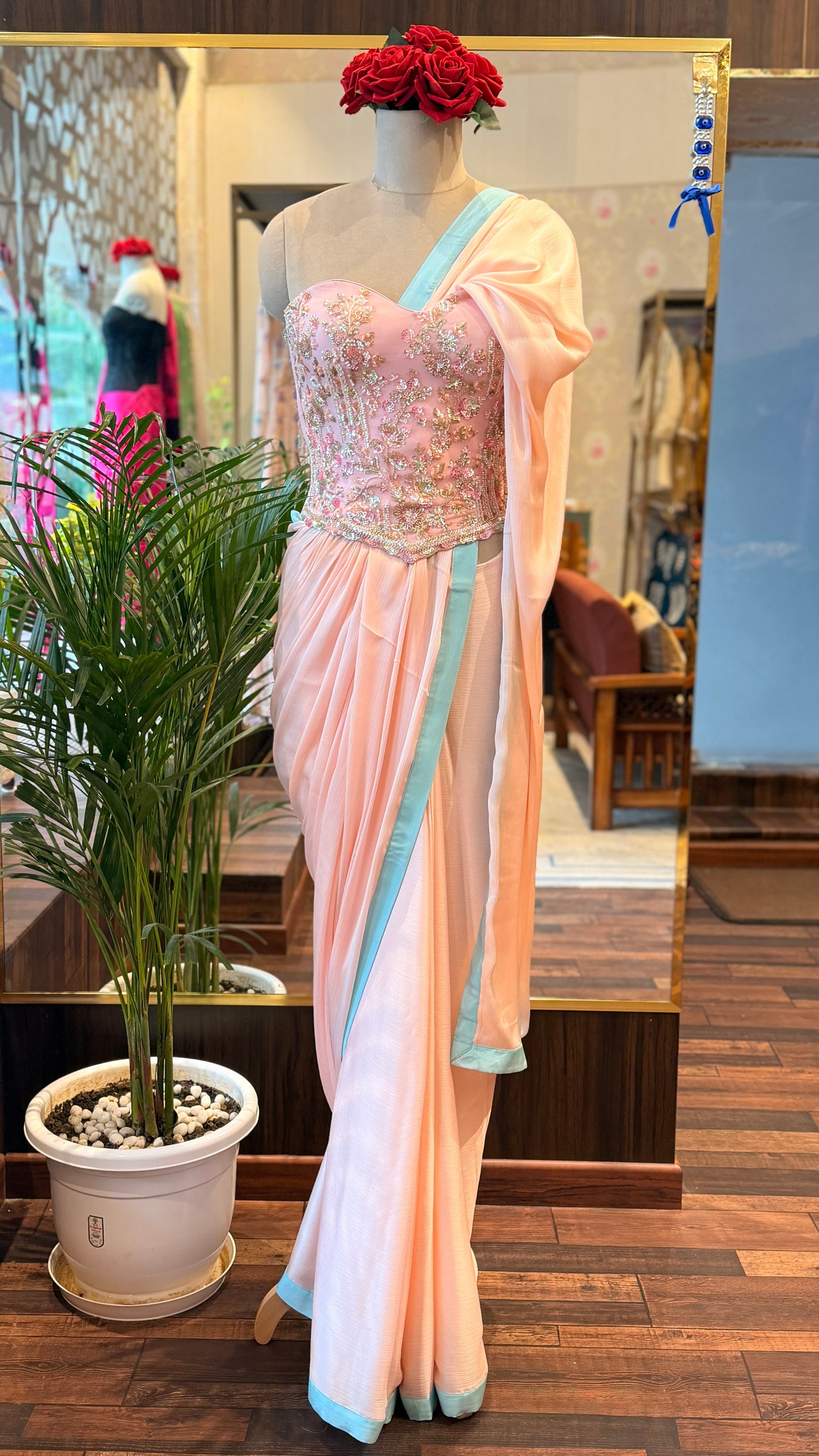 Baby Pink Embellished Corset with Blue Border Saree
