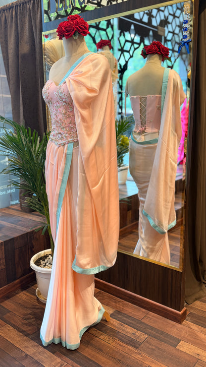 Baby Pink Embellished Corset with Blue Border Saree
