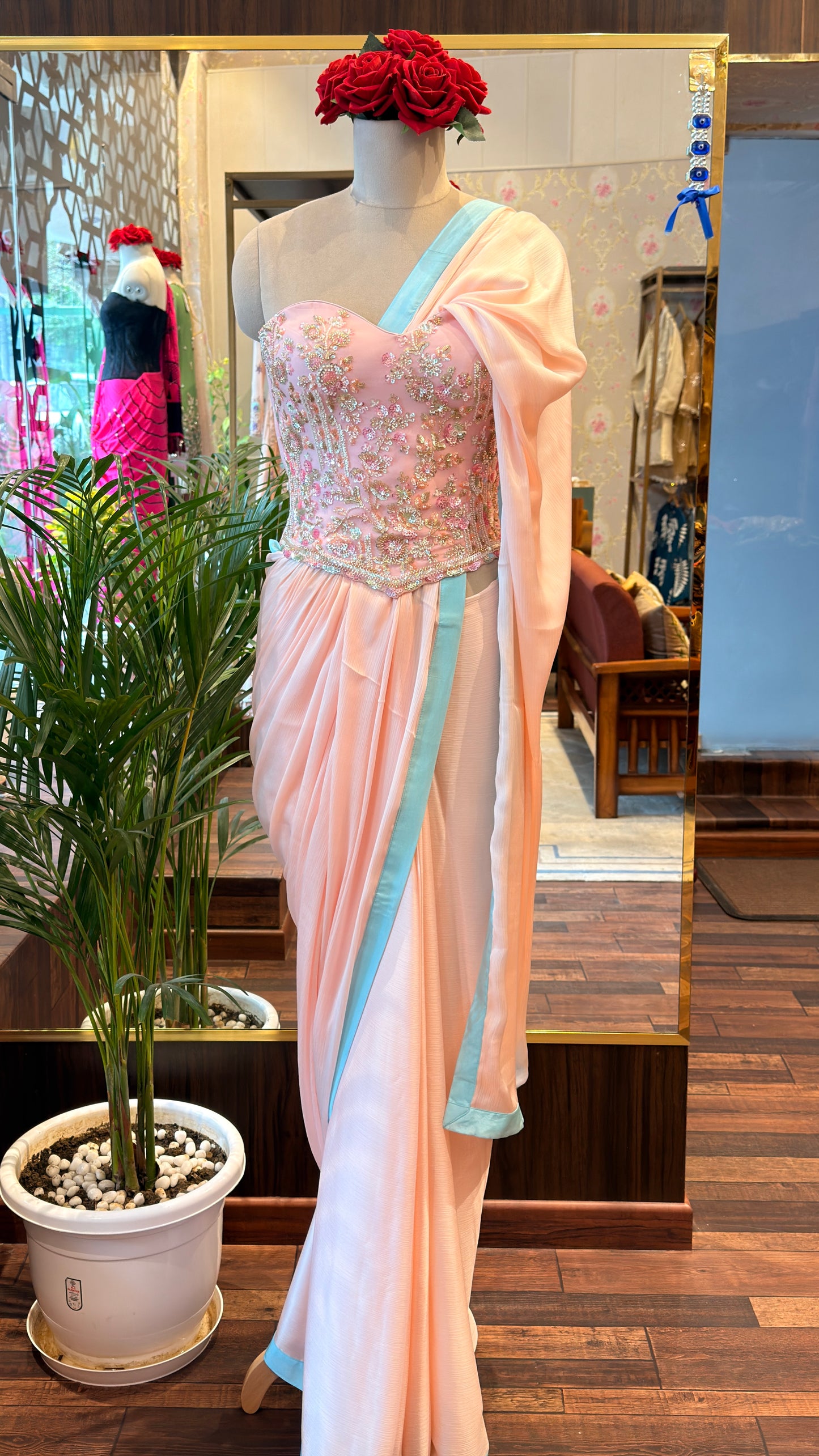Baby Pink Embellished Corset with Blue Border Saree