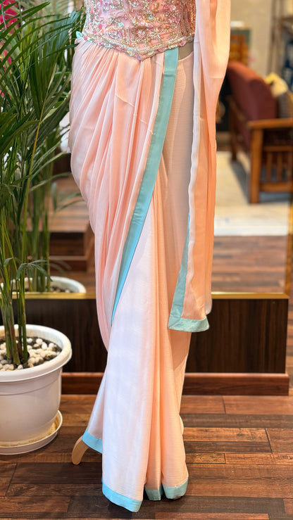 Baby Pink Embellished Corset with Blue Border Saree