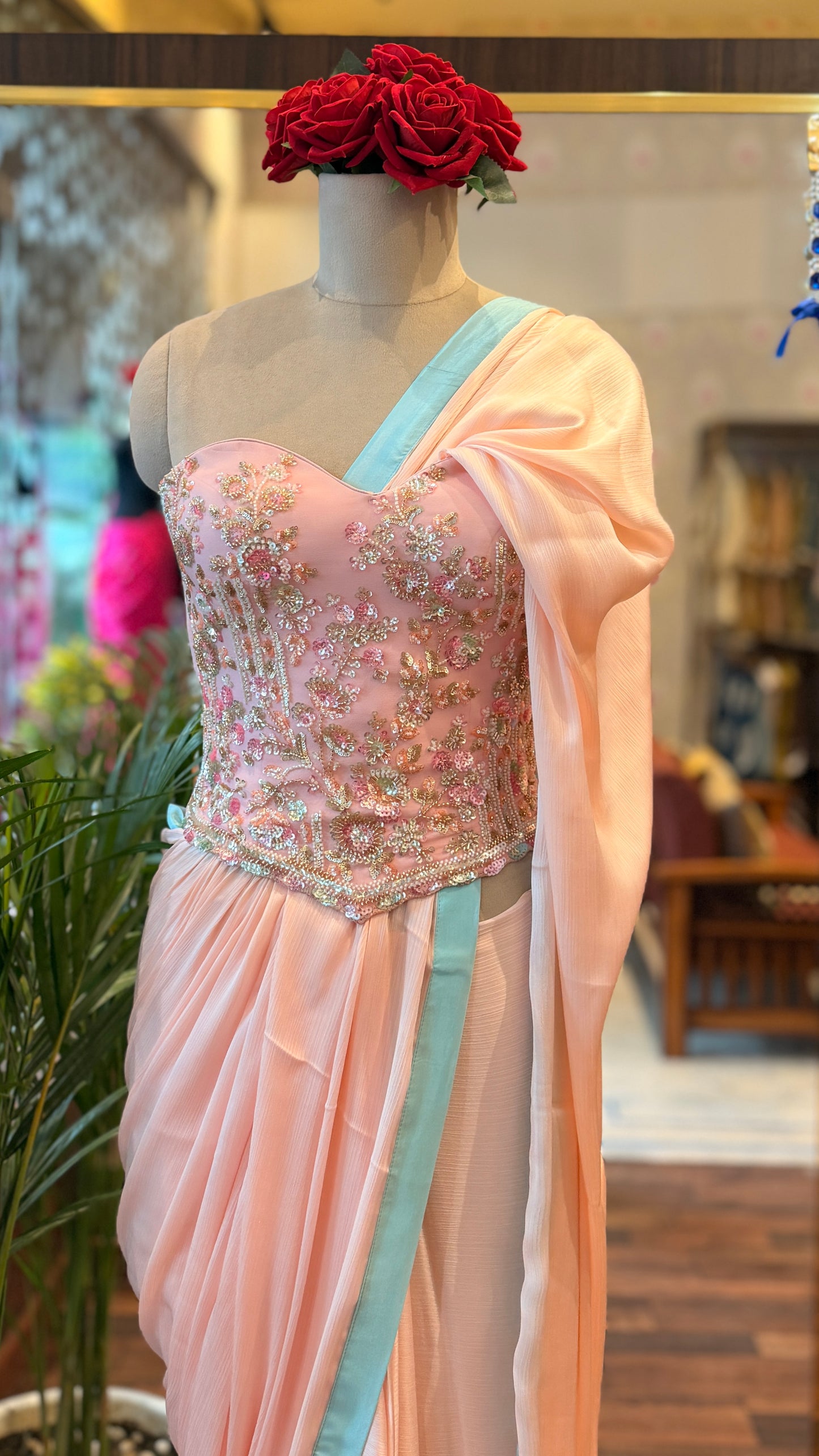 Baby Pink Embellished Corset with Blue Border Saree