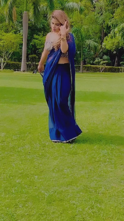 Blue chiffon saree with printed blouse